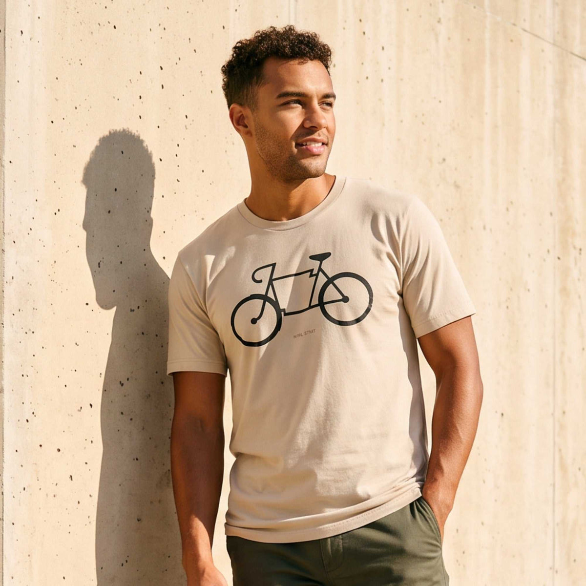 Bike Arkansas Tee in beige cotton with a black line-art bicycle graphic and crew neckline