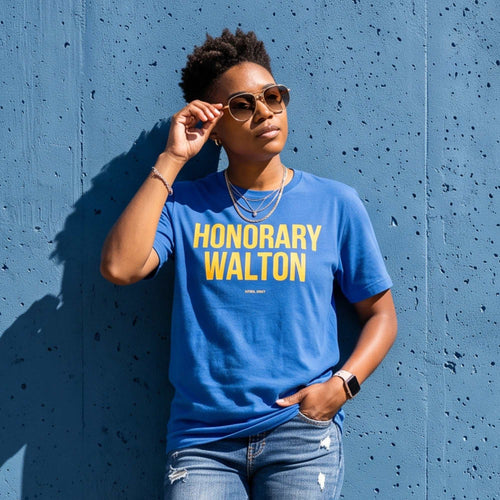 Honorary Walton Tee in blue cotton with bold yellow lettering and a classic crew neckline